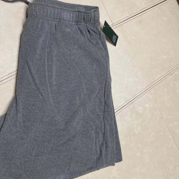 Grey shorts size l tee shirt material. $6 each. I have 24 of them - Picture 2 of 4